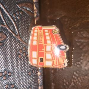 Burberry bus pin